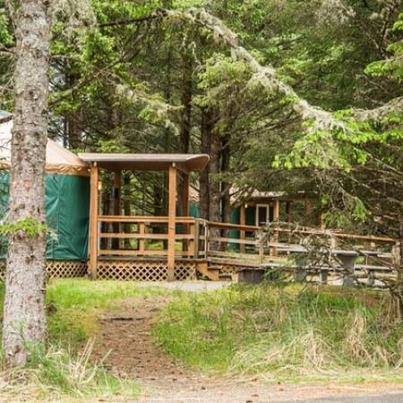 Cape Disappointment Yurt with trees and walking path