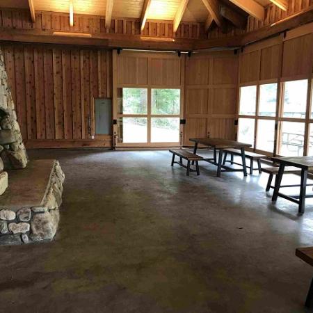 Lake Sylvia Legacy Pavilion Interior with fireplace and tables