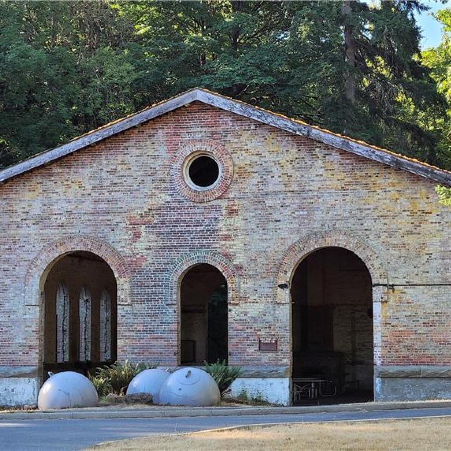 Brick torpedo warehouse with military floats 