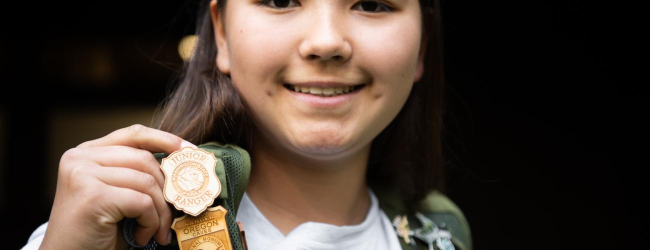 Girl with Junior Ranger Badge.
