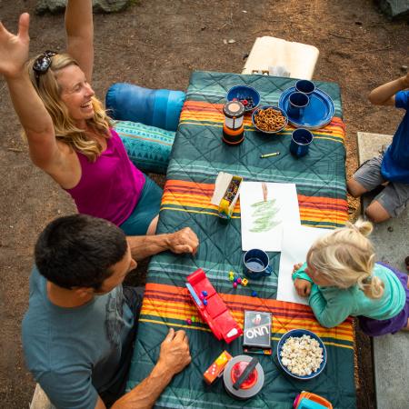 Family camping and playing games.