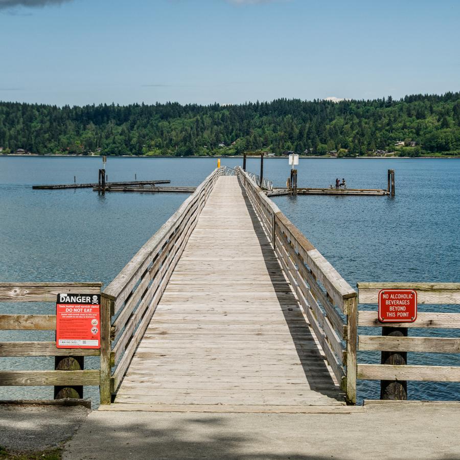 Illahee State Park, pier with moorage dock on port orchard bay and view of bainbridge island