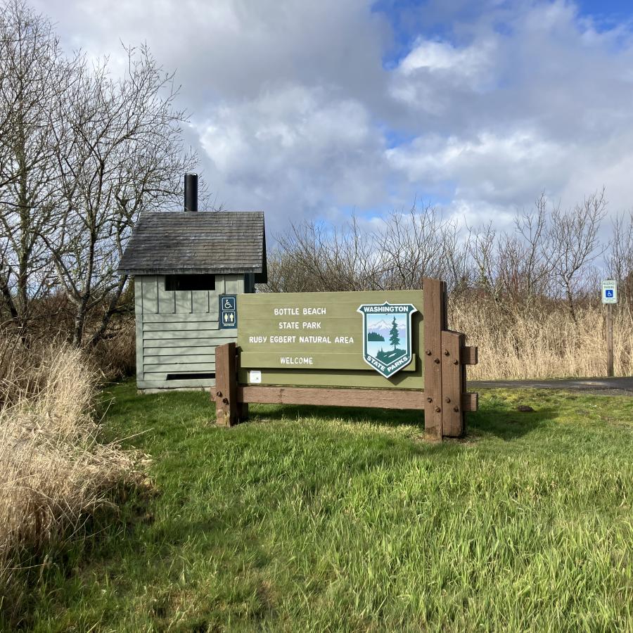 Bottle Beach State Park green welcome sign.