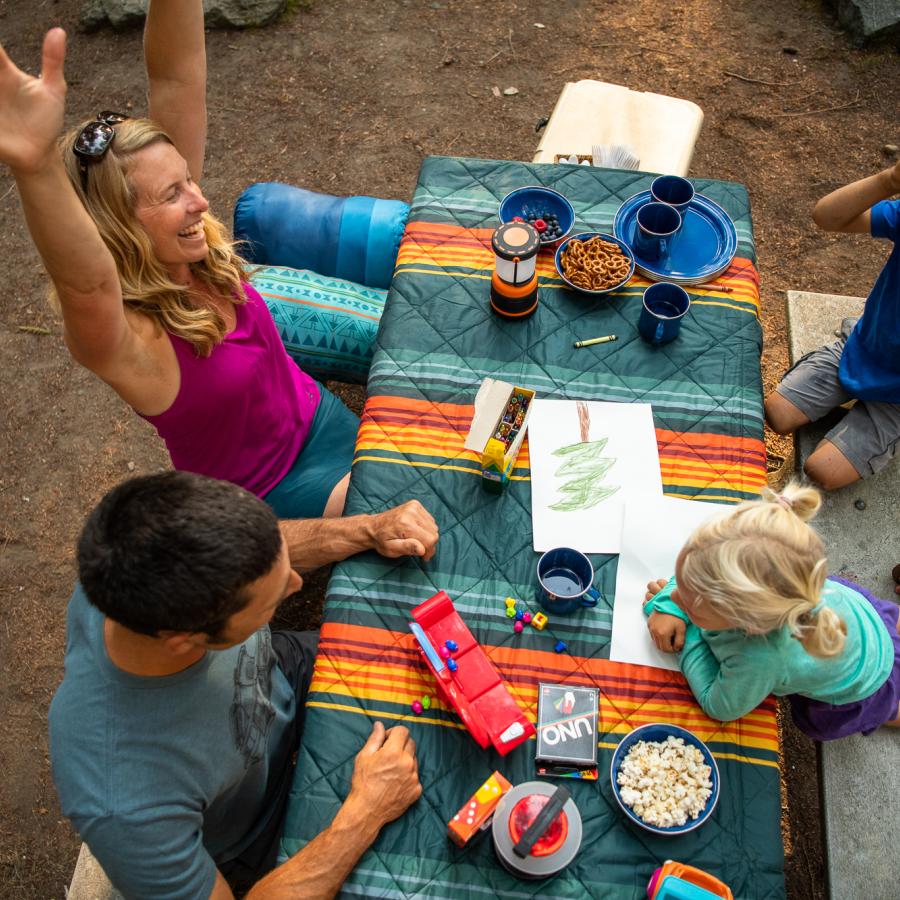 Family camping and playing games.