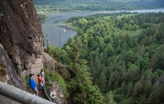 Hikers looking out over Beacon Rock.