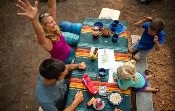 Family camping and playing games.