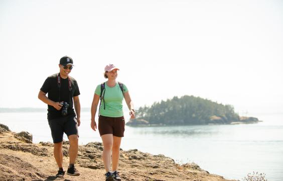 People walking with camera.